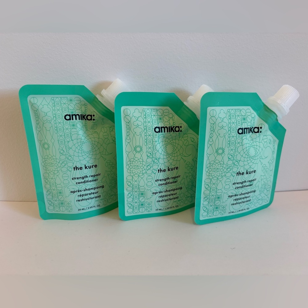 Amika The Kure Conditioner in Aqua Packaging